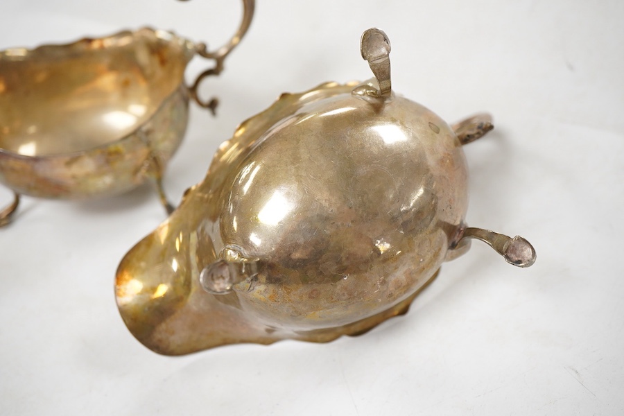 Sundry silver, consisting of - a pair of George V sauce boats, S. Blanckensee & Sons Ltd, Birmingham, 1936, a George III marrow scoop, Peter & Ann Bateman, London, 1793, a Victorian Scottish Kings pattern sauce ladle, te